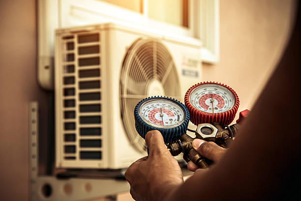 Professional Heat Pump Repair technician working in Saint James, LA